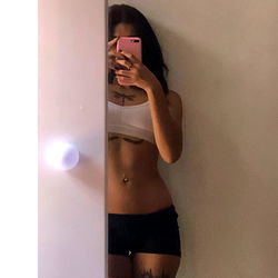 Fashionable Fitness Model Natt in a Gym Mirror with OnlyFans Promotion