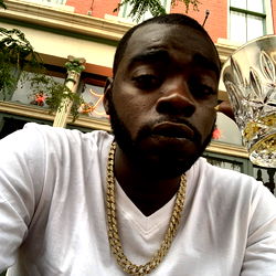 Mr.Piper, aka Young Jeezy, enjoys a moment at a bar in Cincinnati, OH