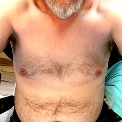Mature Bearded Man with Bare Chest