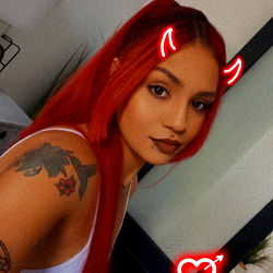 Luna 🌙, an OnlyFans Model, Poses with Devil Horns