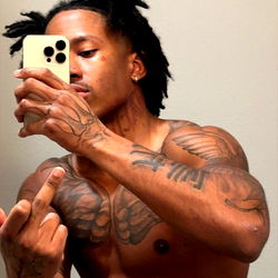 Fit and Muscular Male Model Taking Selfie