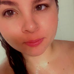 Cali, an OnlyFans model from Waxahachie, sharing her intimate moment in a bathtub with only water.