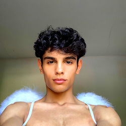 Aladdin Twink Strikes a Pose in Angelic Wings