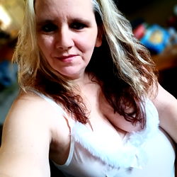 Onlyfans Model Wearing a White Tank Top,