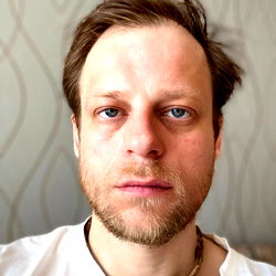 Aging Man in White T-Shirt