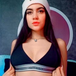 Confident Colombian Model in a Sports Bra