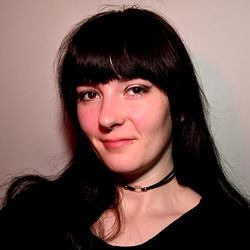 Amelia Ivory, a captivating model with striking eyes and a choker necklace