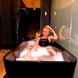 Charlotte, an OnlyFans model, in a relaxing setting