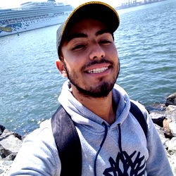 Young Man Smiling at the Camera