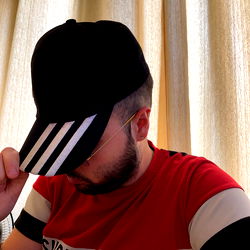 A Man in a Black Cap