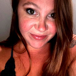 Kitty, a beautiful woman in an OnlyFans model photo