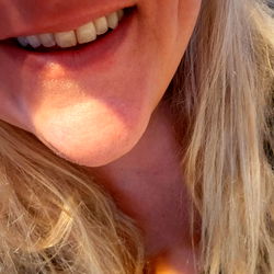 Close-up of a person smiling at the camera