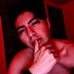 OnlyFans Model AdanSx1120, Shirtless, and Smirking