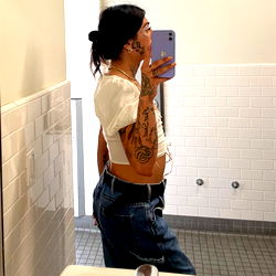 Model Posing in Bathroom