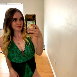 Amaree Ivy, 20-something female in a green swimsuit