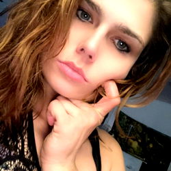 Angel Dior, Onlyfans Model, Captivating the Camera with an Intense Glare