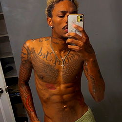 Fit and Tattooed Model with Style