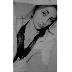 Ale, A Lingerie Model Posing in a Hooded Sweater