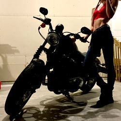 OnlyFans Ruby Baby Standing Next to Parked Motorcycle