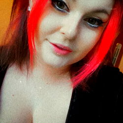 April Redheart, a striking model from the United Kingdom