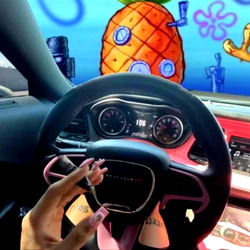 Cigarette in Car with Spongebob Squarepants Sticker