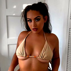 Stunning OnlyFans Model XOXO Strikes a Pose in Bikini