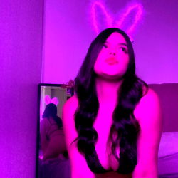 Vivid Purple Bunny Ears: A Playful and Chic Model Photo
