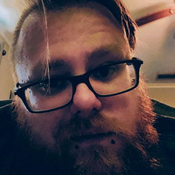 Hipster Man with Beard and Glasses