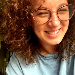 Smiling Woman in Glasses