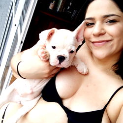 OnlyFans Model Carolina Antunes Poses with Puppy