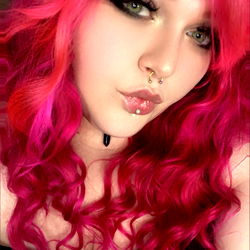 Female Model with Red Hair and Pink Bra