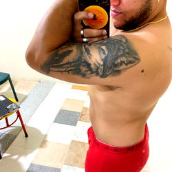 Shirtless Bodybuilder in Red Boxer Briefs