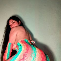 Charlot, OnlyFans Model in Stunning Colored Swimsuit