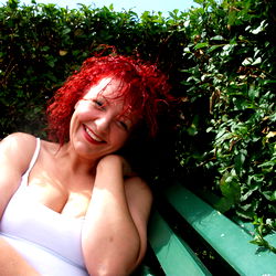 Redheaded Woman Posing for OnlyFans