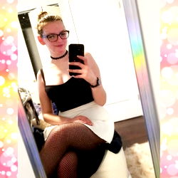 Tori's Playful Style with Fishnet Stockings