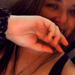 Ab in a black tank top with a necklace