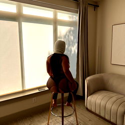 Latina Sheisty Model in Chair