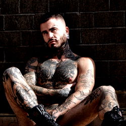 Tattooed Male Model in Urban Setting