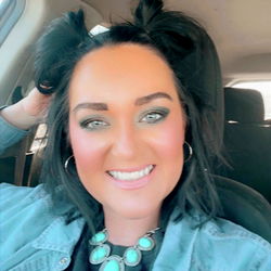 Smiling Woman with Ponytail and Bangs