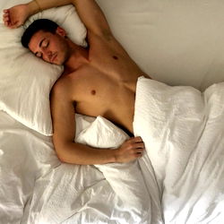 Alberto Levi in a cozy bed