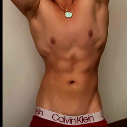 Buff Asian Model Showcasing Abs