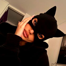 Fashionable Model with Cat Ears and Masked Face