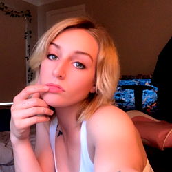 Young Woman with Blonde Hair, Casual Attire