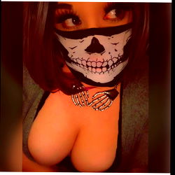 Skull-faced woman in a mask, from Instagram