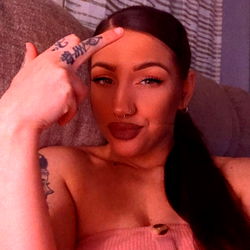 Woman with Tattoos and Piercings