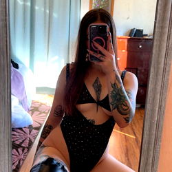 OnlyFans Model Ari, 23, Female, in a Sensual Pose