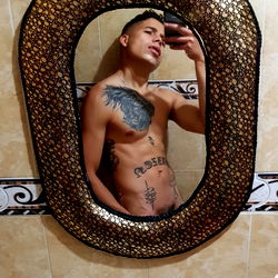 Arthur Tattoo in a Bathroom Mirror