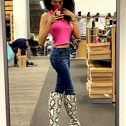 Stylish Snake Print Boots in Shoe Store