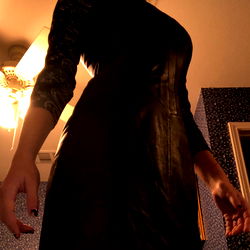 Model Showcasing Leather Dress