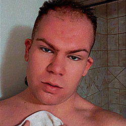 A Surprised OnlyFans Model in a Bathroom